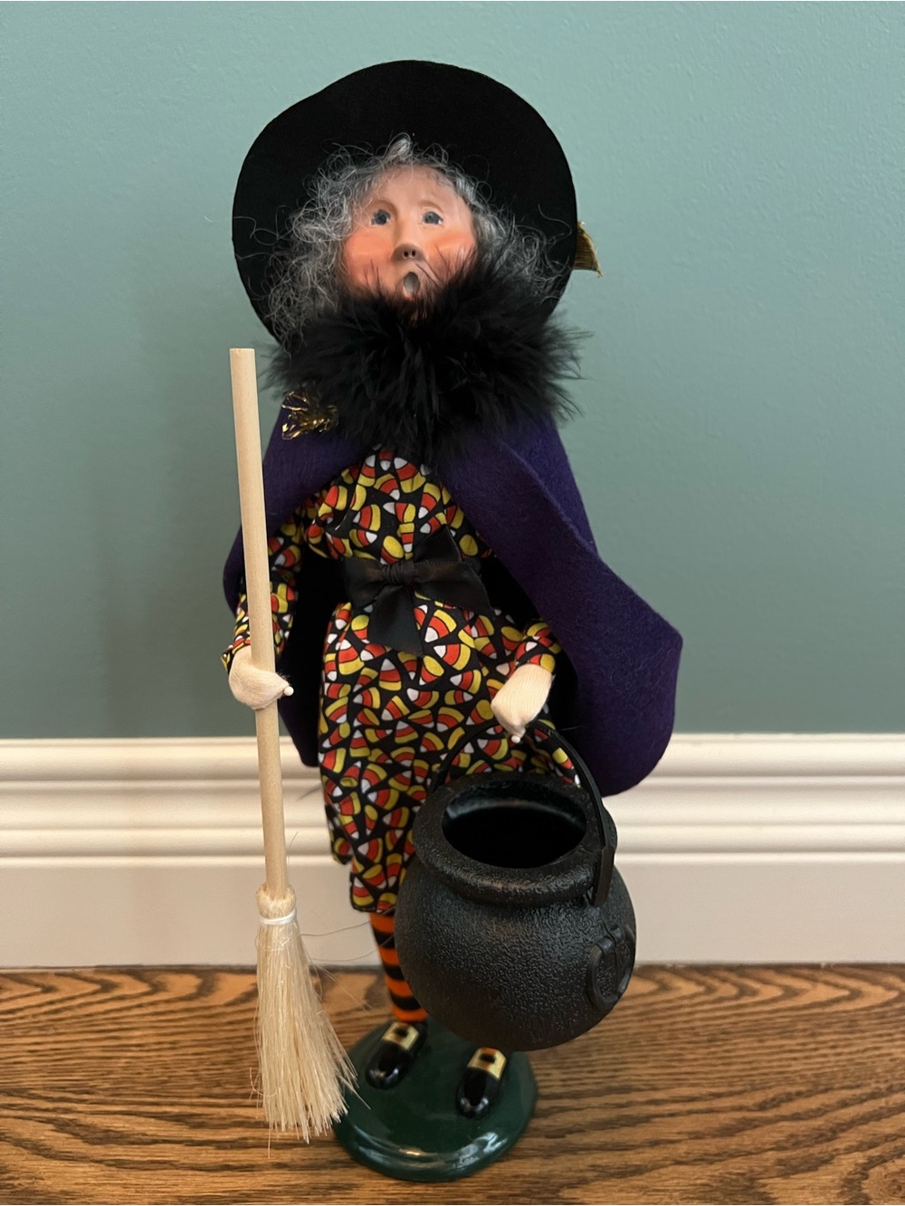 Byers Choice Witch with Candy Corn Dress holding Cauldron and Broom.